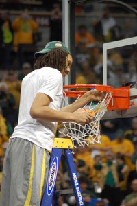 Baylor's Brittney Griner cuts down the 2012 nets in Denver.