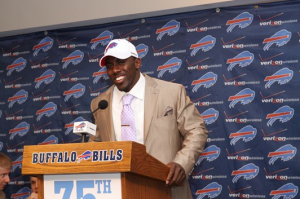 Where did C.J. Spiller even get a tie that color?